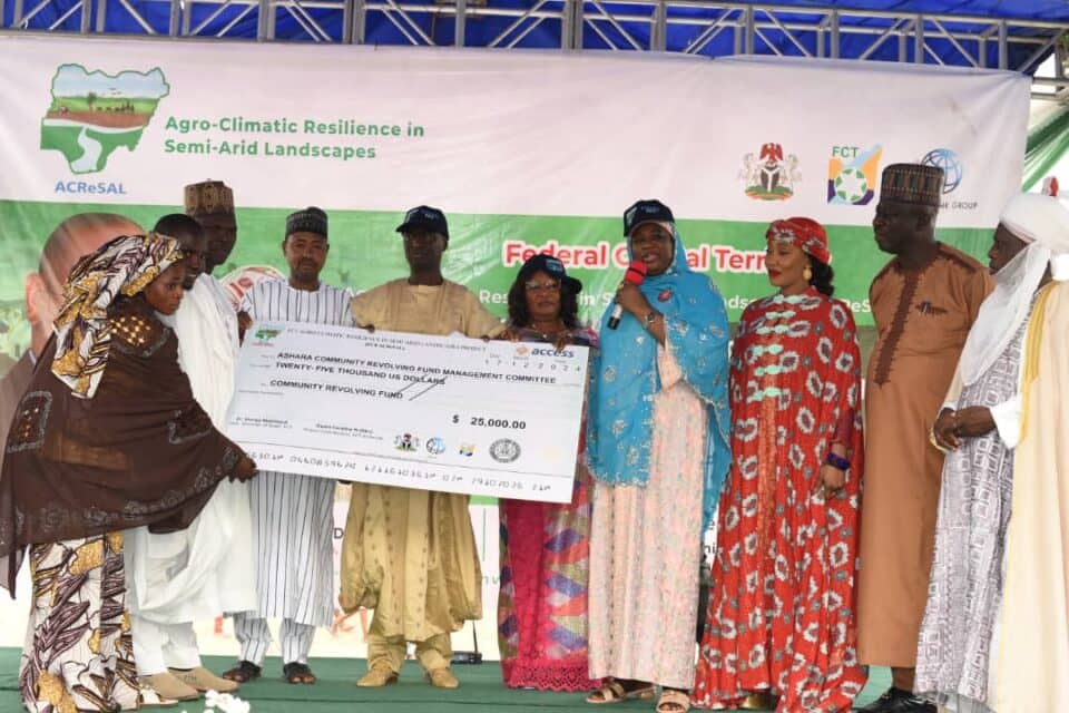 FCT COMMUNITIES GET W’BANK $250,000 AcReSAL LOAN